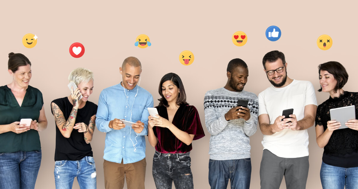 happy diverse people using smartphones
